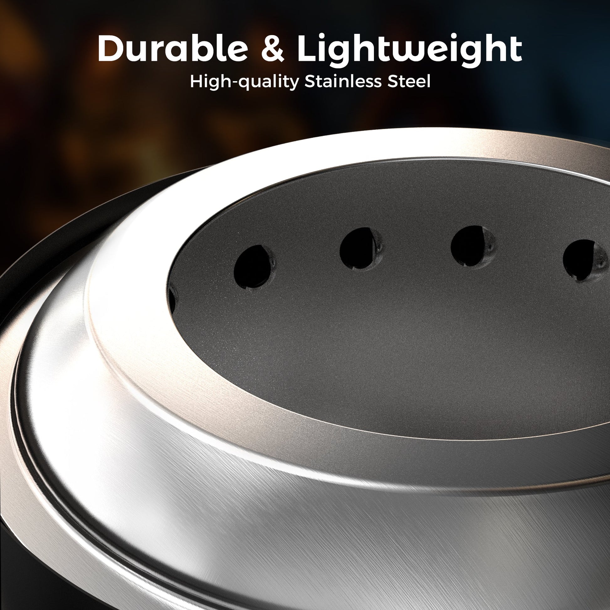 Black 6.5 inch wood stainless steel tabletop fire pit, close-up of brushed metal texture and air vents.